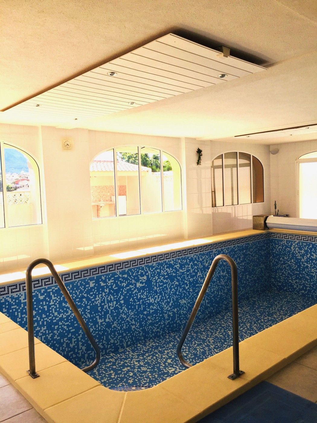 The indoor swimming pool.