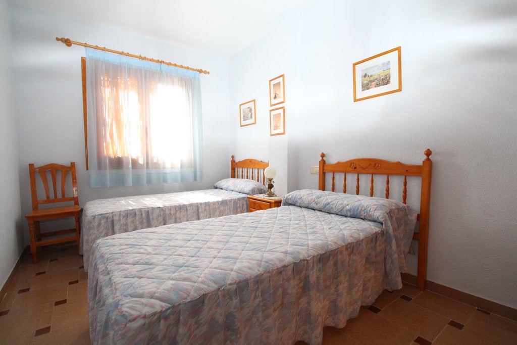 Bedroom with two beds.